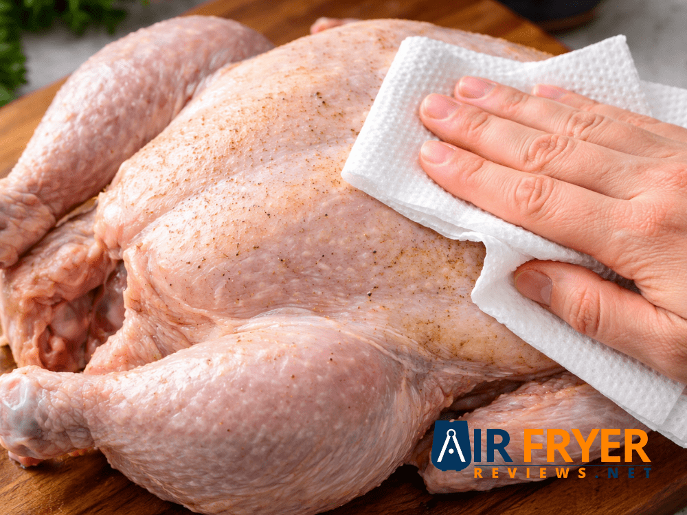 close up of skin being patted dry with paper towels Air Fryer Reviews