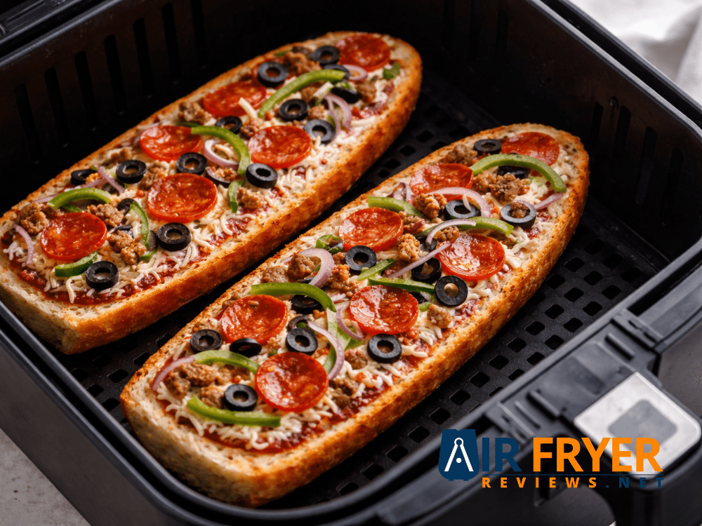Air Fryer French Bread Pizza (Homemade&Frozen)+Troubleshooting Guide 16 A basket style air fryer with French bread pizza inside Air Fryer Reviews