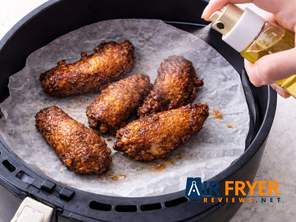 oil mist over wings in the basket Air Fryer Reviews